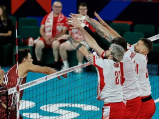 Volleyball players forming a block at the net during Poland vs Latvia at Men’s EuroVolley 2026